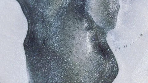 Ink background glitter drip grey fluid flow white Video stock 260881371