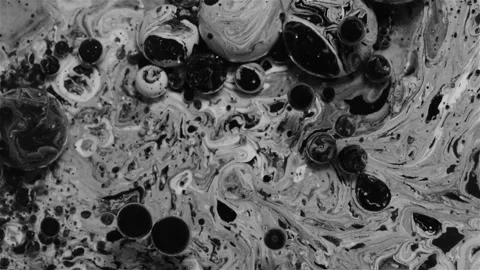 Ink balls exploding and making a beautiful abstract background. Stock Footage 345827853