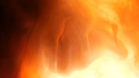 Ink being poured into water,phantom flex. Red,orange,yellow and black. Inks in w Stock Footage 85579238