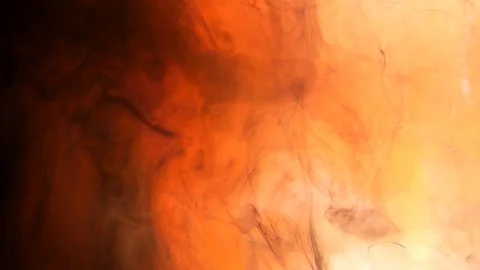 Ink being poured into water,phantom flex. Red,orange,yellow and black. Inks in w Stock Footage 85579239