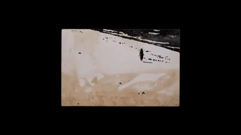Ink bleeding onto a blank vintage postcard, seamless loop Stock Footage 346767085