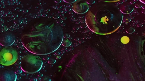 Ink blend background liquid pigment yellow purple Stock Footage 260881684