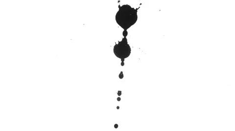 Ink blots are falling on the white paper Stock Footage 23720829