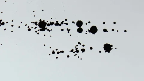 Ink blots on paper Stock Footage 79099600