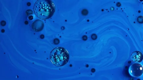 Ink blue bubbles in water Stock Footage 80903390