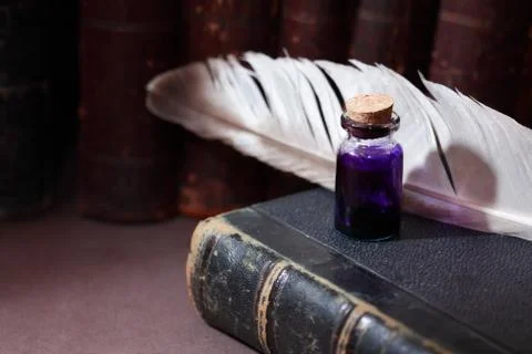 Ink Bottle On Book Stock Photos