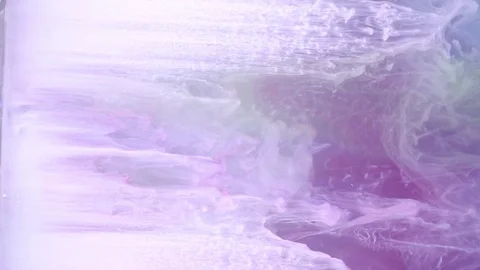 Ink of bright blue color pouring into colored water on white background texture Stock Footage 75962953