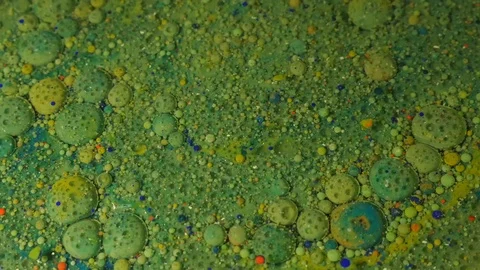 Ink Bubbles In Water. Green Bubbles.Bright Collors Bubbles Slow Motion Oil Beaut Stock Footage 86174119