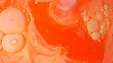 Ink Bubbles In Water. Orange Bubbles.Bright Collors Bubbles Oil Beautiful Paint  Stock Footage 86390294