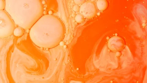 Ink Bubbles In Water. Orange Bubbles.Bright Collors Bubbles Oil Beautiful Paint  Stock Footage 86390298