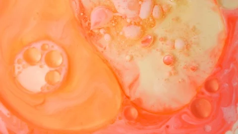 Ink Bubbles In Water. Orange Bubbles.Bright Collors Bubbles Oil Beautiful Paint  Stock Footage 86450696