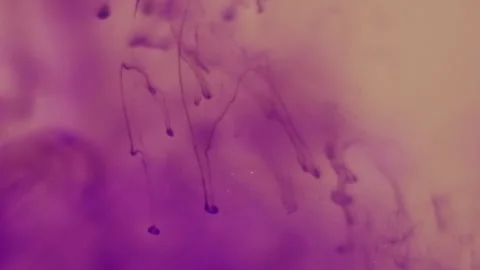 Ink cloud color water liquid splash fume glitter Stock Footage 339768420