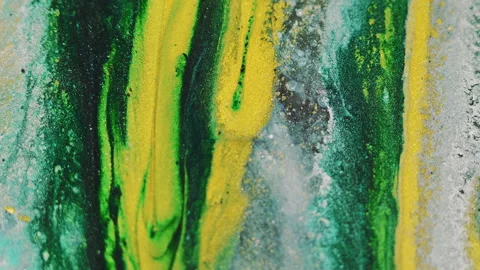 Ink drip glitter liquid spill yellow green paint Stock Footage 274450646