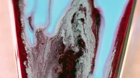 Ink drip paint spill blue red black fluid mix flow Stock Footage 267511034