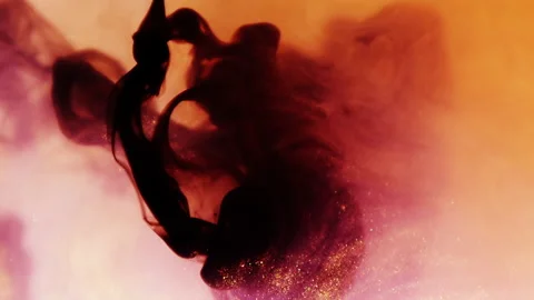 Ink drop and dance in water. Ink glittering in slow motion. Stock Footage 134018341