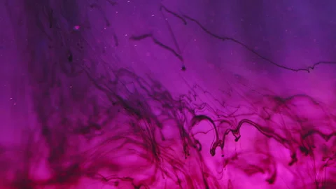Ink drop background liquid pigment black purple Video stock 255627492