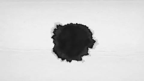 Ink Drop Bleed On Grain Textured Paper Background Video stock 346237797