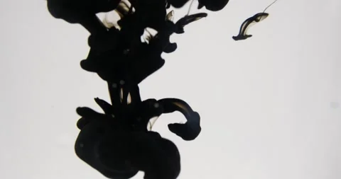 Ink dropping in liquid forming ink flow background artistic view Stock Footage 218645523