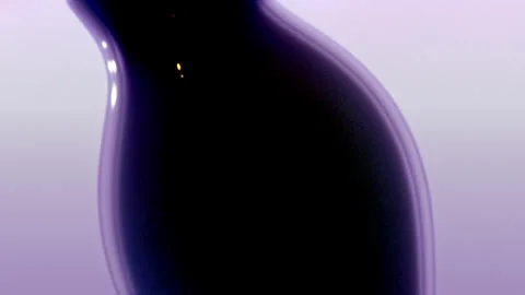 Ink drops falling and merging on purple background Stock Footage 303360365