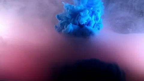 Ink drops in water in slow motion. Abstarct colorful rainbow paint in water Stock Footage 101072104