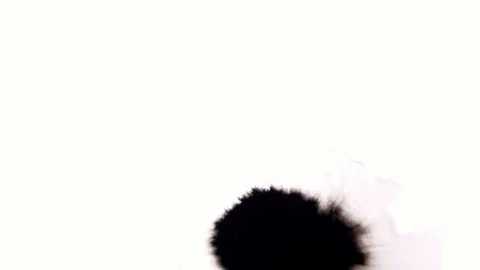 Ink drops on white surface. Stock Footage 85661609