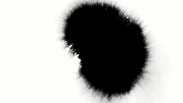 Ink drops on white surface. Stock Footage 85661693