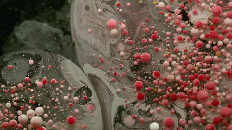 Ink explosion bubble emulsion paint particles mix Stock Footage 318305560