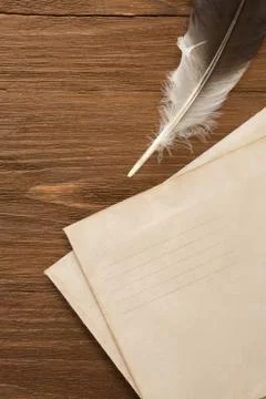 Ink feather with envelope Stock Photos