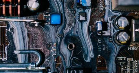 Ink flow digital hardware glitter water microchip Stock Photos