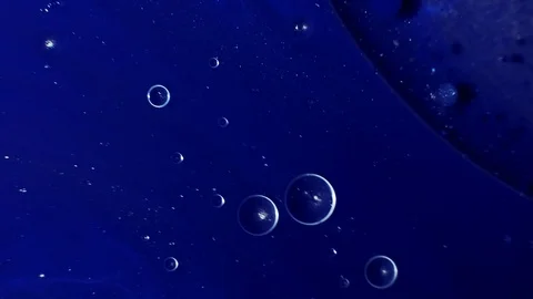 Ink flow solar system navy blue paint spill fluid Stock Footage 116165587