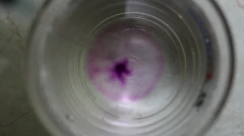 Ink in a glass of water Stock Footage 56081445