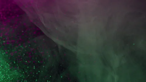 Ink mist puff paint glowing liquid pigment flow Video stock 314501648
