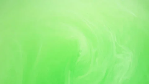 Ink mix liquid paint cloud ink neon green vortex Stock Footage 296263349