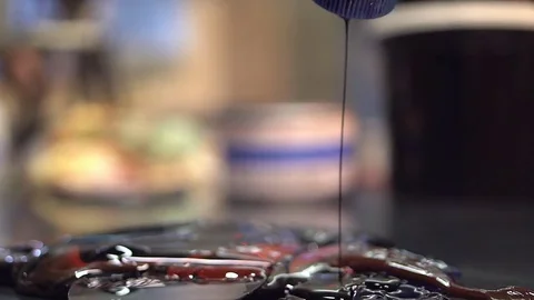 Ink Mixing - Adding Black Stock Footage 76103392