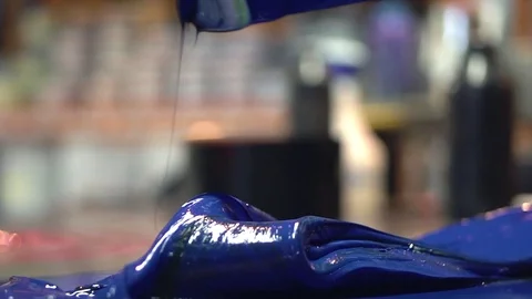 Ink Mixing - Mixing in Turquoise Stock Footage 76863500