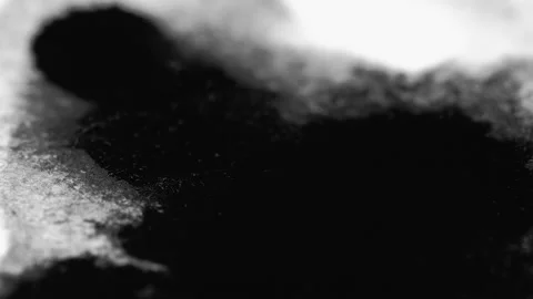 Ink paper blot stain texture black paint on white Stock Footage 192981660