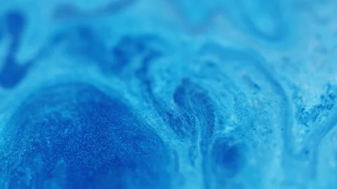 Ink particles acrylic fluid liquid marble water Video stock 317525942
