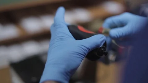 Ink Proofing - Applying the Ink Sample to the Proofing Roller Stock Footage 76103302