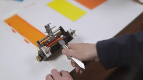 Ink Proofing with a Hand Proofer Stock Footage 76089595