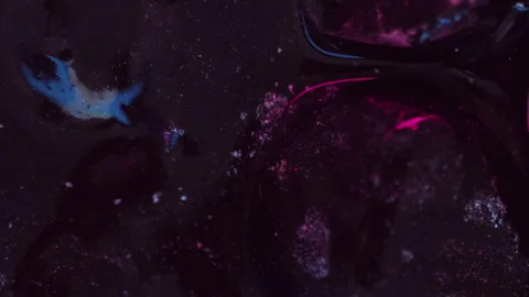 Ink spill glowing fluid wave neon shiny paint dark Video stock 278381424
