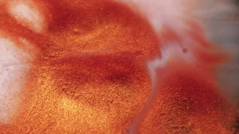 Ink splash glitter explosion shine copper spill Stock Footage 314493750