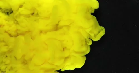 ink splash yellow background | Stock Video | Pond5
