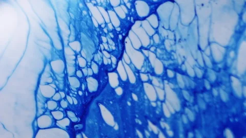Ink splatter dye expansion blue paint spread mix Stock Footage 323187493