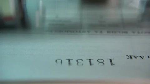 Ink-stamping device used to sequentially mark paper forms. Close up 動画素材 327987474