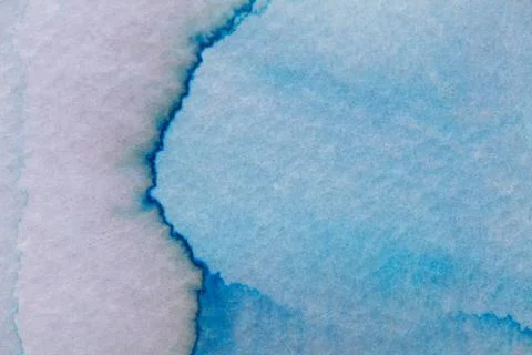 Ink strokes create dynamic blue patterns on textured paper surface Illustrazione stock