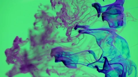 Ink in water green background Stock Footage 74099737