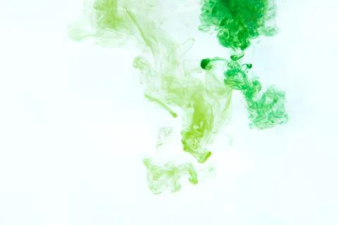Ink in water shot with high speed camera. Mint green, white colors oil paint  写真素材