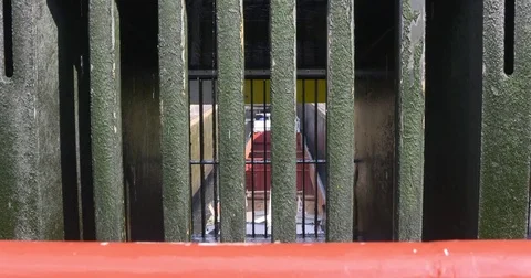 Inland cargo ship departs ship lock under by the steel lock gate Stock Footage 69991353