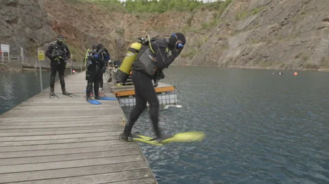 Inland Scuba Diving in a quarry - multiple jumps in Stock Footage 48578896