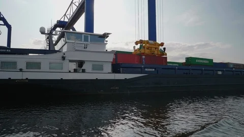  Inland vessel is being loaded at a container terminal. Stock Footage 113398525